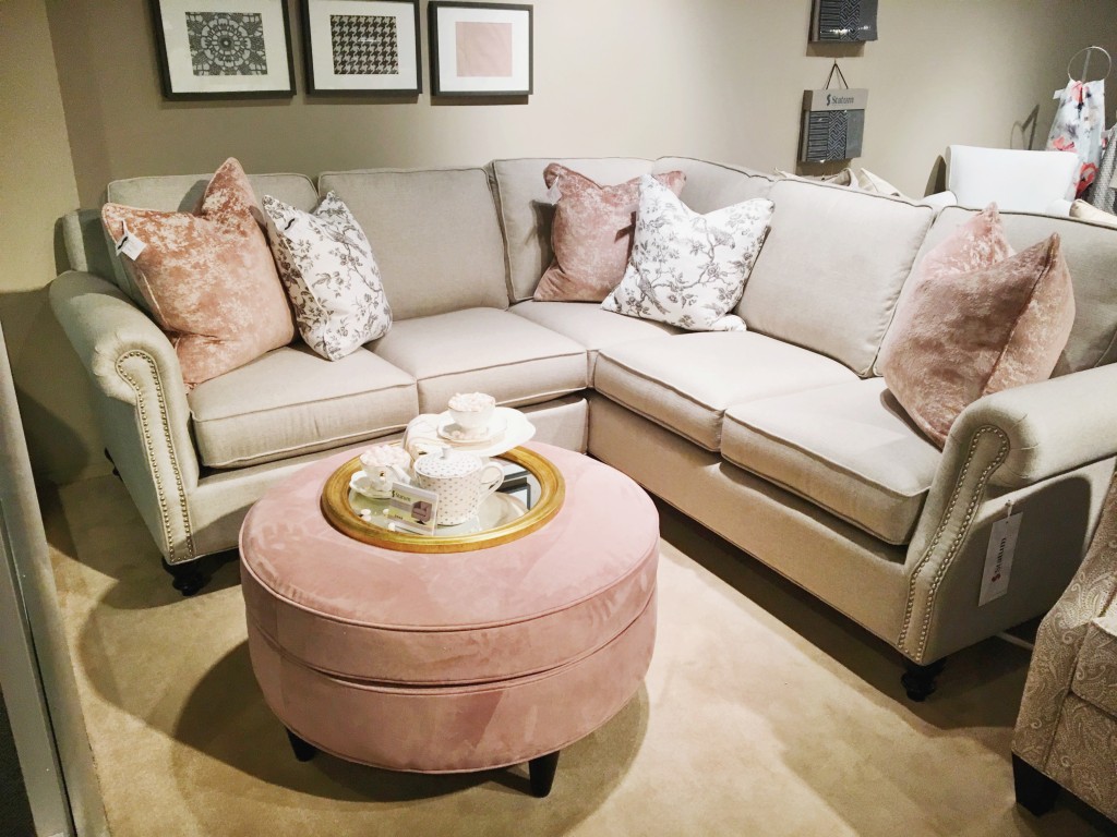 Rose Quartz and Serenity pillows add the perfect soft punch of color to this sectional from Statum.