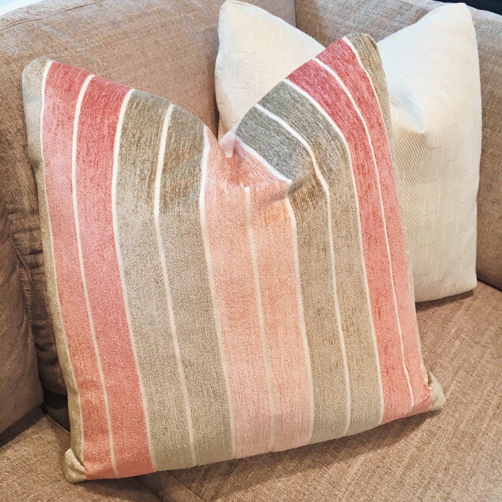 Hesitant to jump into a color scheme? Pick up a pair of pillows with the colors you're looking for to test the waters. Beautiful rose quartz and serenity pillow found at Rowe. 
