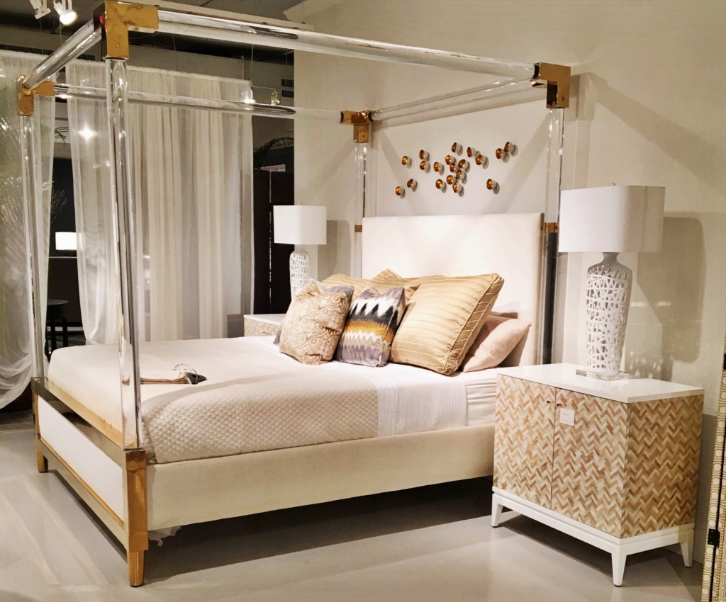 Bernhardt uses acrylic in all the right places on this canopy bed.