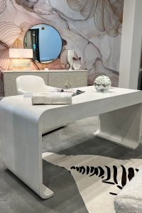 A rounded white desk